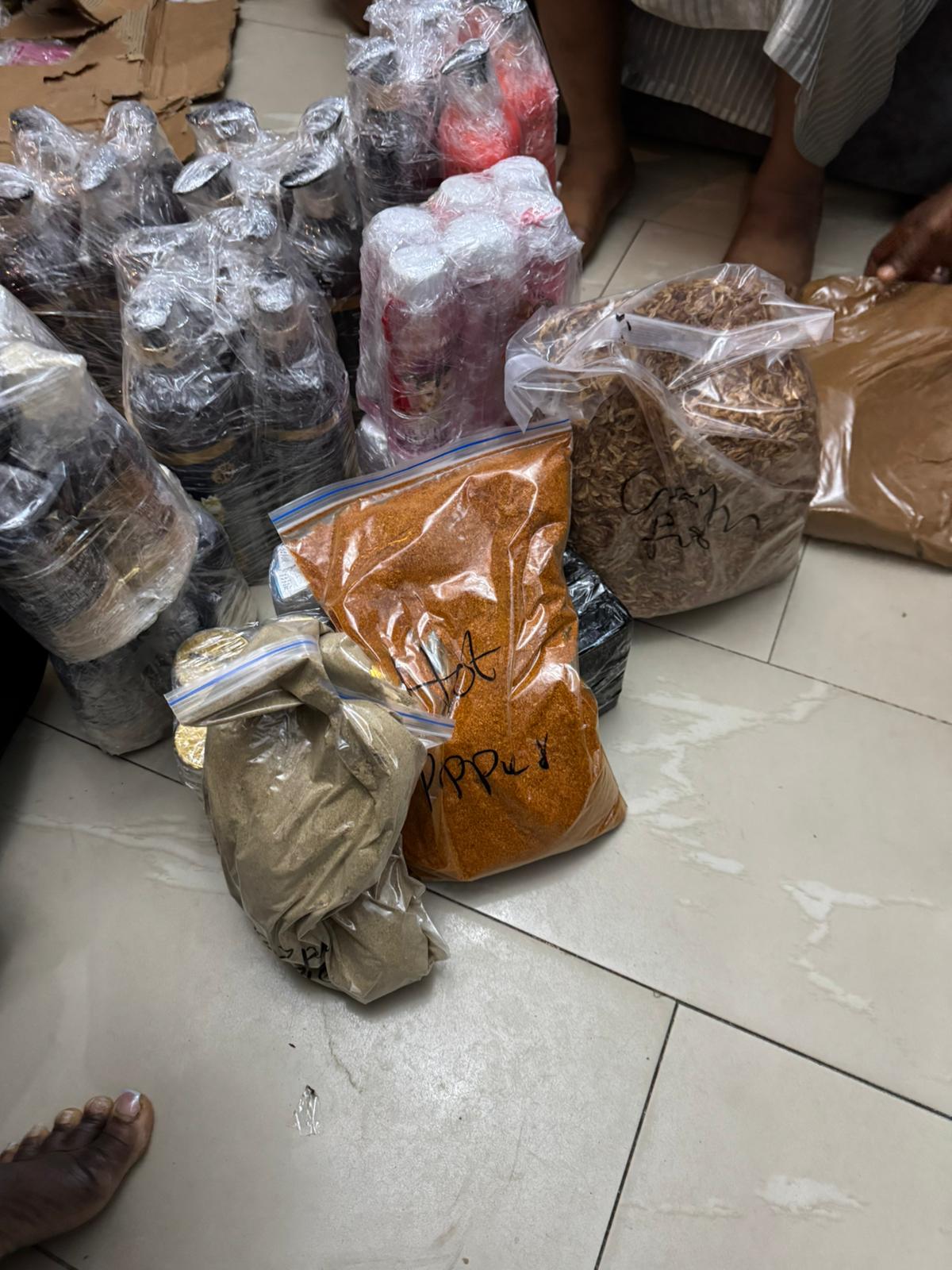 Food stuffs and African goods being packed for shipping from Lagos to Germany