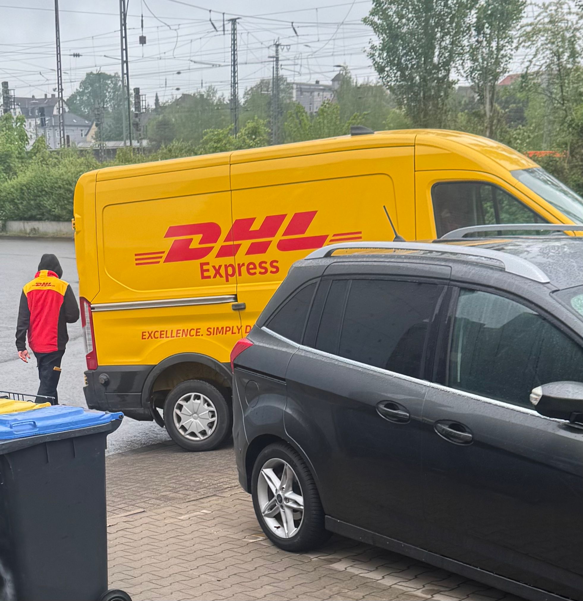 Happy German customer receiving package shipped from Nigeria by MO Logistics